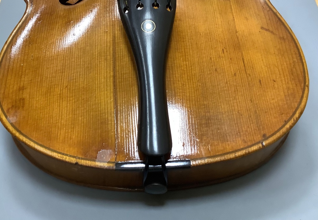 An early 20th century violin, unlabelled case, with bow, length 60cm